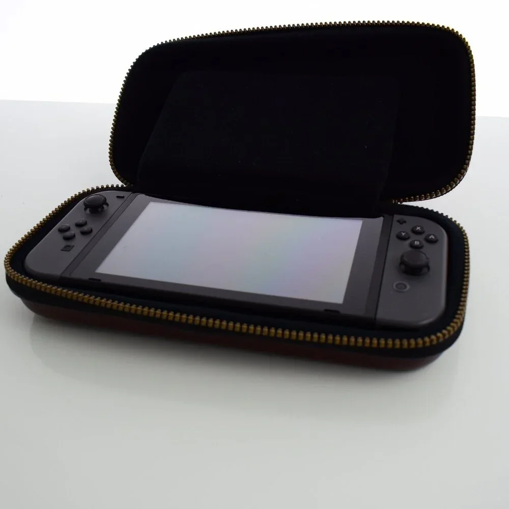 Nintendo Switch HAC-001 32GB Console with Gray Joy‑Con, Zelda case & 8 games inc